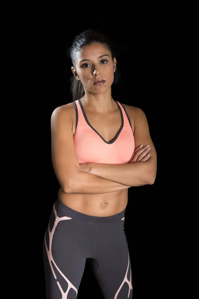 Latin sport woman posing in fierce and badass face expression with fit slim body — Stock Photo, Image