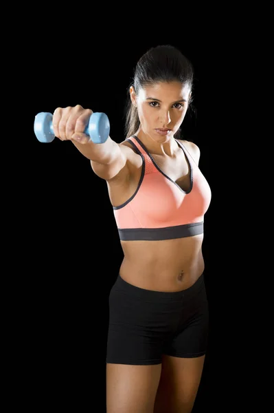 Latin sport woman posing in fierce expression holding dumbbell hand weigh — Stock Photo, Image