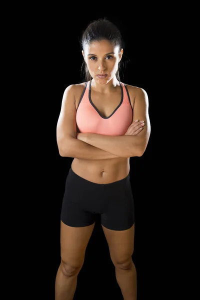 Latin sport woman posing in fierce and badass face expression with fit slim body — Stock Photo, Image