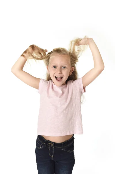 Beautiful and happy female child gesturing excited and smiling cheerful rising arms isolated on white — Stock Photo, Image