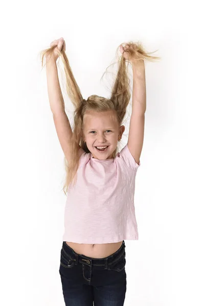 Beautiful and happy female child gesturing excited and smiling cheerful rising arms isolated on white — Stock Photo, Image