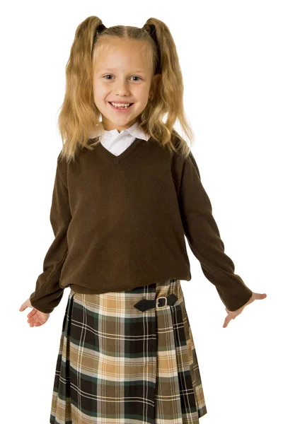 Joven hermosa colegiala feliz en coletas y uniforme sonriendo feliz y emocionado divertirse — Foto de Stock