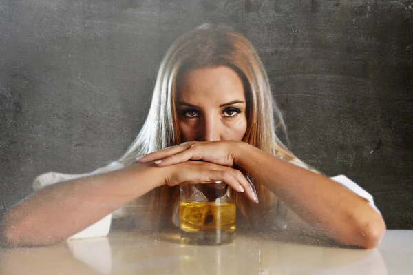 Drunk alcoholic woman wasted and depressed holding scotch whiskey glass drunk — Stock Photo, Image