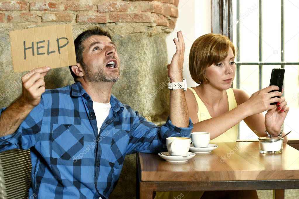 couple at coffee shop  mobile phone addict woman ignoring frustrated man asking for help 