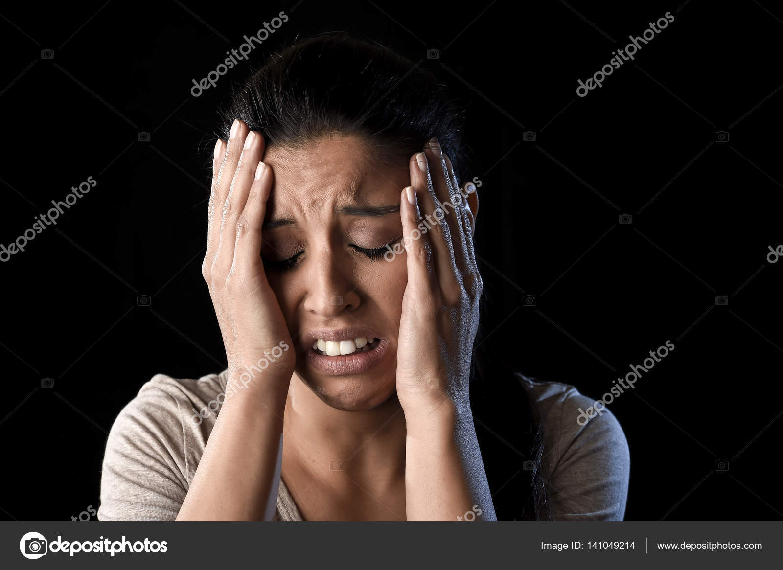 Attractive sad and desperate Latin woman crying frustrated suffering  problems in sadness and stress Stock Photo by ©focuspocusltd 141049214