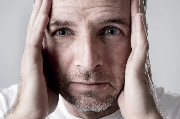 Man with blue eyes sad and depressed looking lonely and suffering depression feeling sorrow — Stock Photo, Image