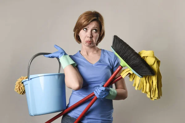 Service woman in washing rubber gloves carrying cleaning bucket — Stock Photo, Image