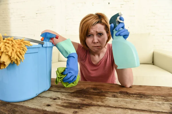 Woman cleaning living room table with cloth and spray bottle tired in stress — Stock Photo, Image