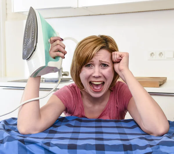 angry woman or crazy busy housewife ironing shirt lazy at home k