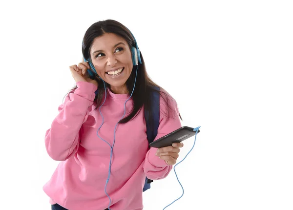 Young woman or student girl with mobile phone listening to music headphones singing and dancing — Stock Photo, Image