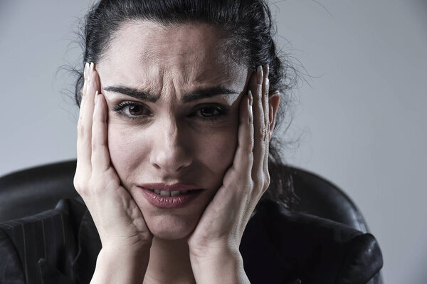 close up attractive business woman working at office in stress suffering intense headache