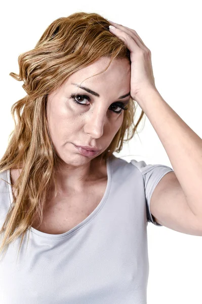 Depressed woman looking desperate in pain face expression suffering migraine and headache — Stock Photo, Image