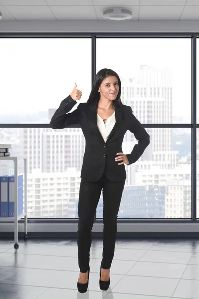 Woman wearing formal suit smiling happy and confident at modern office — Stock Photo, Image