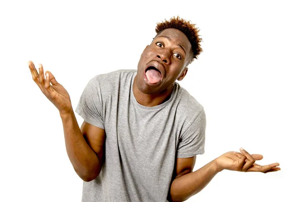 American man looking happy and playful gesturing showing confused and lost silly face — Stock Photo, Image