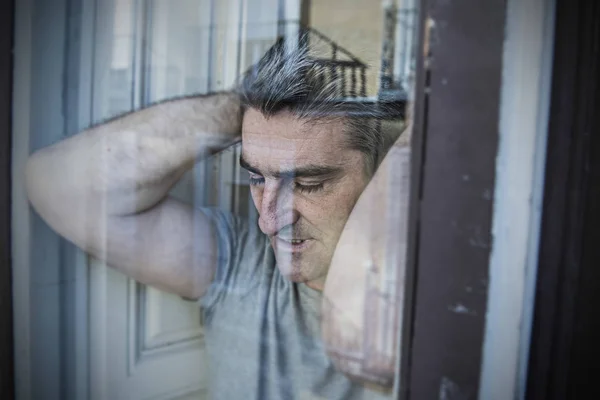 Close up portrait of sad and depression man looking through w — Stok Foto