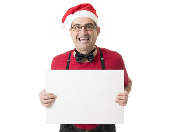 Engraçado 40s para 50s louco homem de vendas em Santa chapéu de Natal com bo — Fotografia de Stock