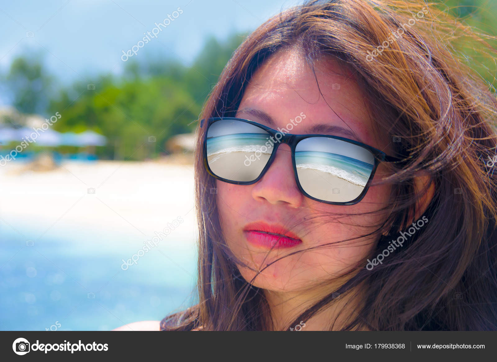 Close up face portrait of young beautiful Asian woman wearing - Main Image