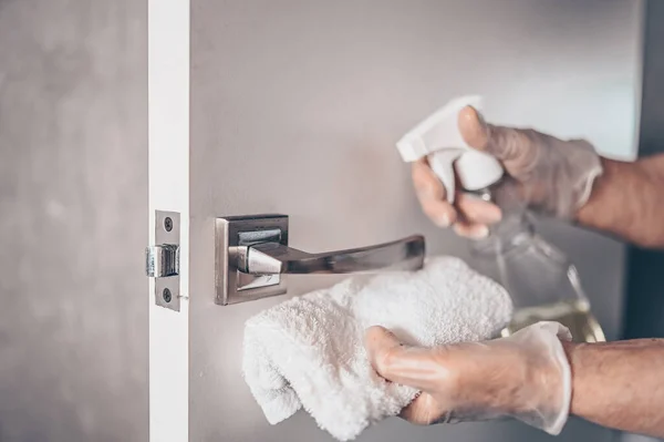 Coronavirus Covid Prevention Cleaning Woman Wiping Doorknob Antibacterial Disinfecting Spray — Stock Photo, Image