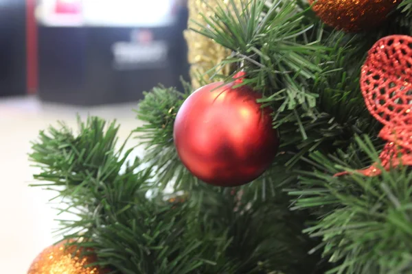 Red Christmas Ball Green Fluffy Christmas Tree — Stock Photo, Image