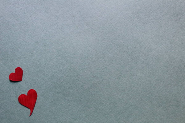 red hearts on a light or gray background