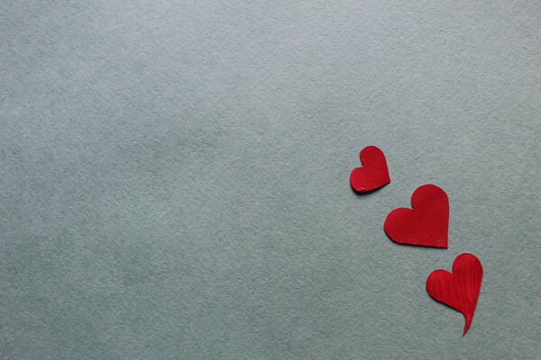 red hearts on a light or gray background