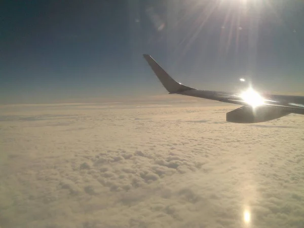 View Plane Window Early Morning Sun Shines Dense White Clouds — Stock Photo, Image