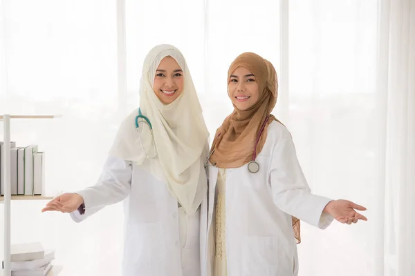 Portrait Two Muslim Female Doctor Standing Office — Zdjęcie stockowe