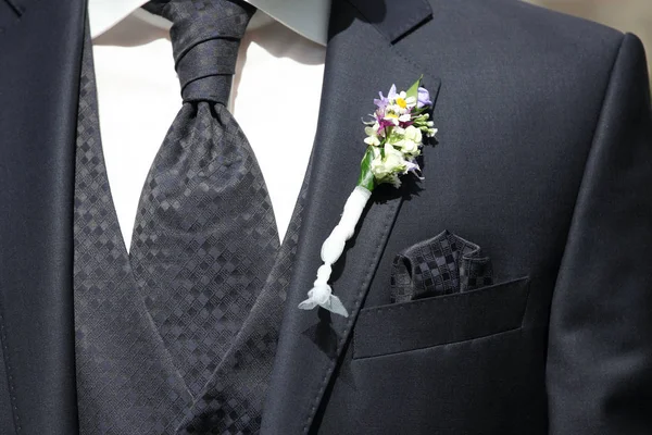 Groom with flower — Stock Photo, Image