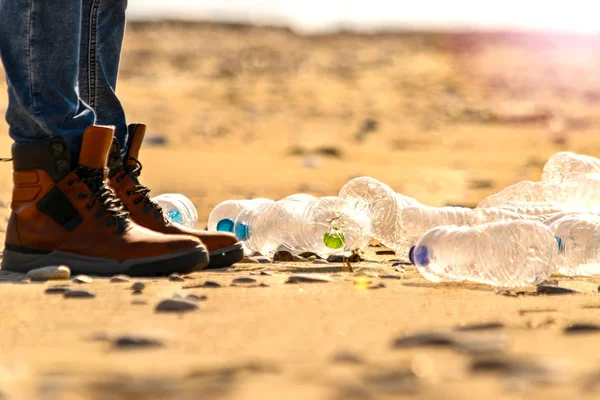 Person Standing Sand Plastic Bottles Pollution Concept — Stock Photo, Image