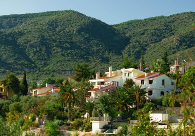 Small cozy buildings in mountains