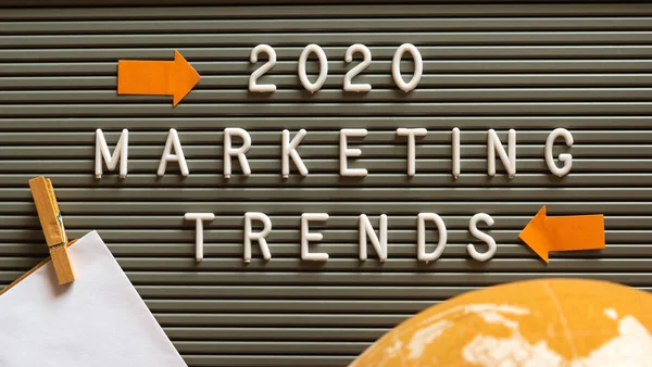 2020 Marketing Trends with plastic letters on typesetting board