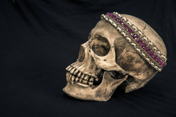 Still life with a human skull with the old, in with the diamond 
