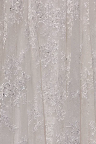 Részletek a menyasszony ruha szövet és gyönyörű hímzés e — Stock Fotó