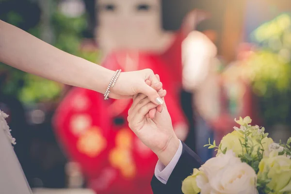 Young express love with a handshake as a symbol of love — Stock Photo, Image