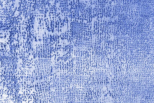 plaster background, modern aged texture, blue and white pattern. Abstraction