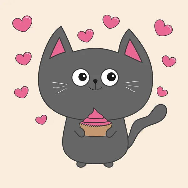 Chat gris tenant cupcake — Image vectorielle