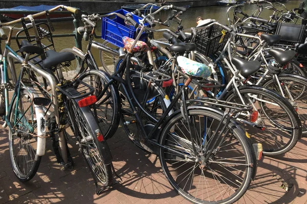 Bicycle Parking on the waterfront, Amsterdam, Netherlands, concept of ecology and healthy lifestyle