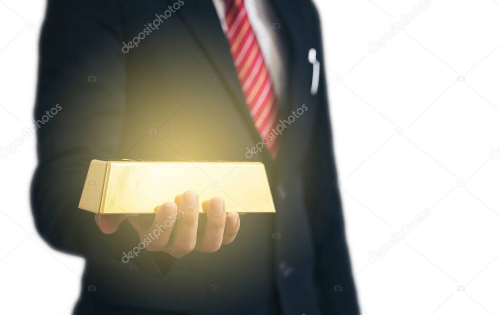 businessman holding gold bar on white background