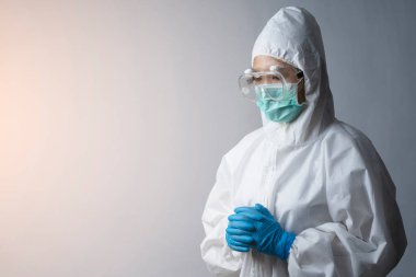 Doktor ya da sağlık ekibi kişisel koruyucu ekipman ya da PPE, Coronavirus ya da Covid-19 salgını konseptinde