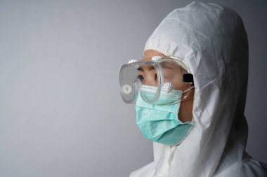 Doktor ya da sağlık ekibi kişisel koruyucu ekipman ya da PPE, Coronavirus ya da Covid-19 salgını konseptinde