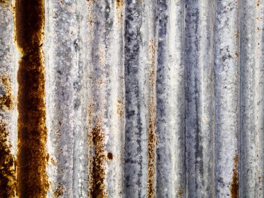 Sarı desenli paslı kahverengi metal duvar. metal pas doku arka plan.