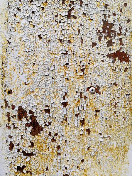 Rusty brown metal wall with yellow patterns. metal rust texture background.