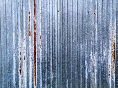Old blue worn metal surface with paint background. Abstract corroded colorful rusty metal background. Rusty metal texture. Classic blue color of the year 2020 concept. Copy space.