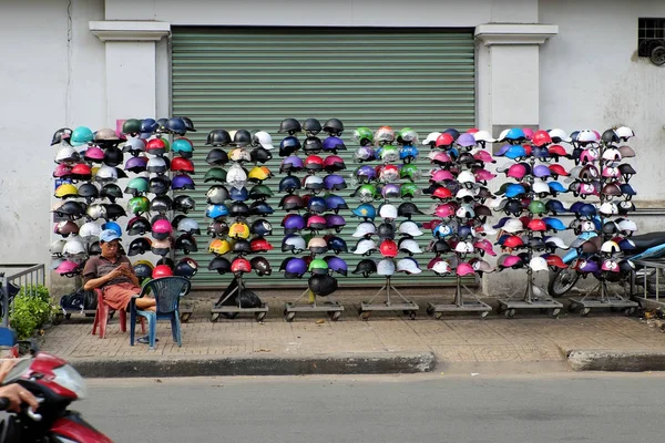 Helmets open air shop on pavement — Stock Photo, Image