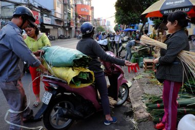 Traditional leaf market near Tet, leaves, bamboo rope, cake mold