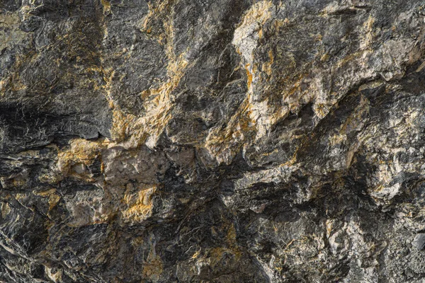 Oro textura mineral antimonio primer plano. Fondo de superficie de piedra mineral . Imágenes De Stock Sin Royalties Gratis