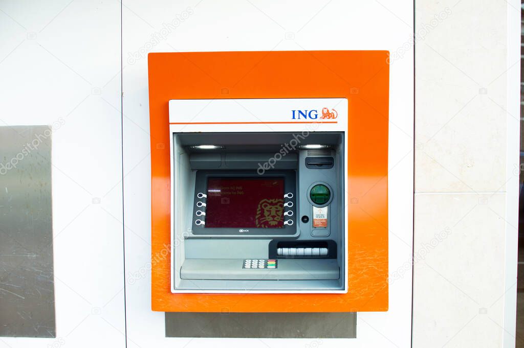 Elst, Netherlands - March 7, 2020: Dutch ING ATM, with orange ING logo