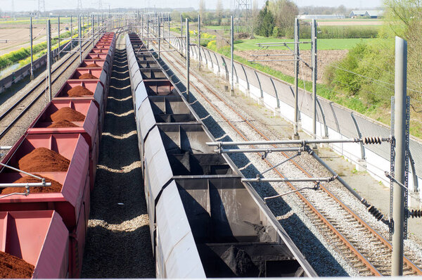 A loaded freight train and a empty freight train near Nijmegen, Netherlands
