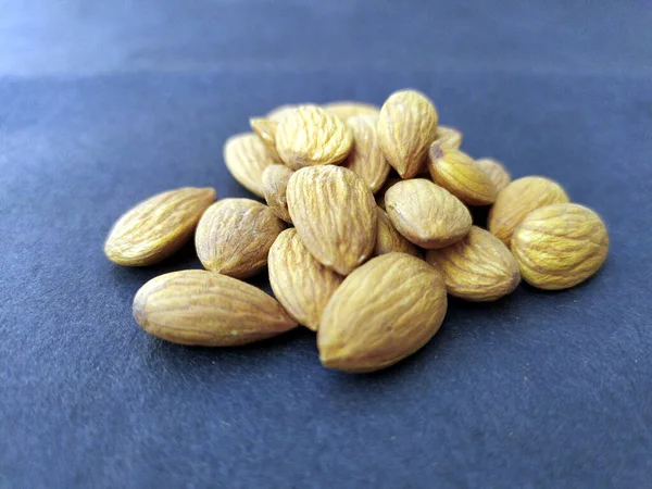 Some Fresh Healthy Almonds Put Black Background — Stock Photo, Image