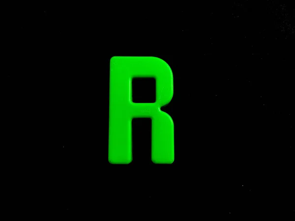 English Plastic Alphabet Letter Isolated Black Background — Stock Photo, Image